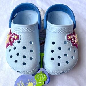 CROCS Kids Sky Blue Clogs with light up shooting star